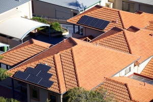 Solar Panels on the roofs of Australian Homes. Photo Source - http://www.flickr.com/photos/thelastminute/7461522300